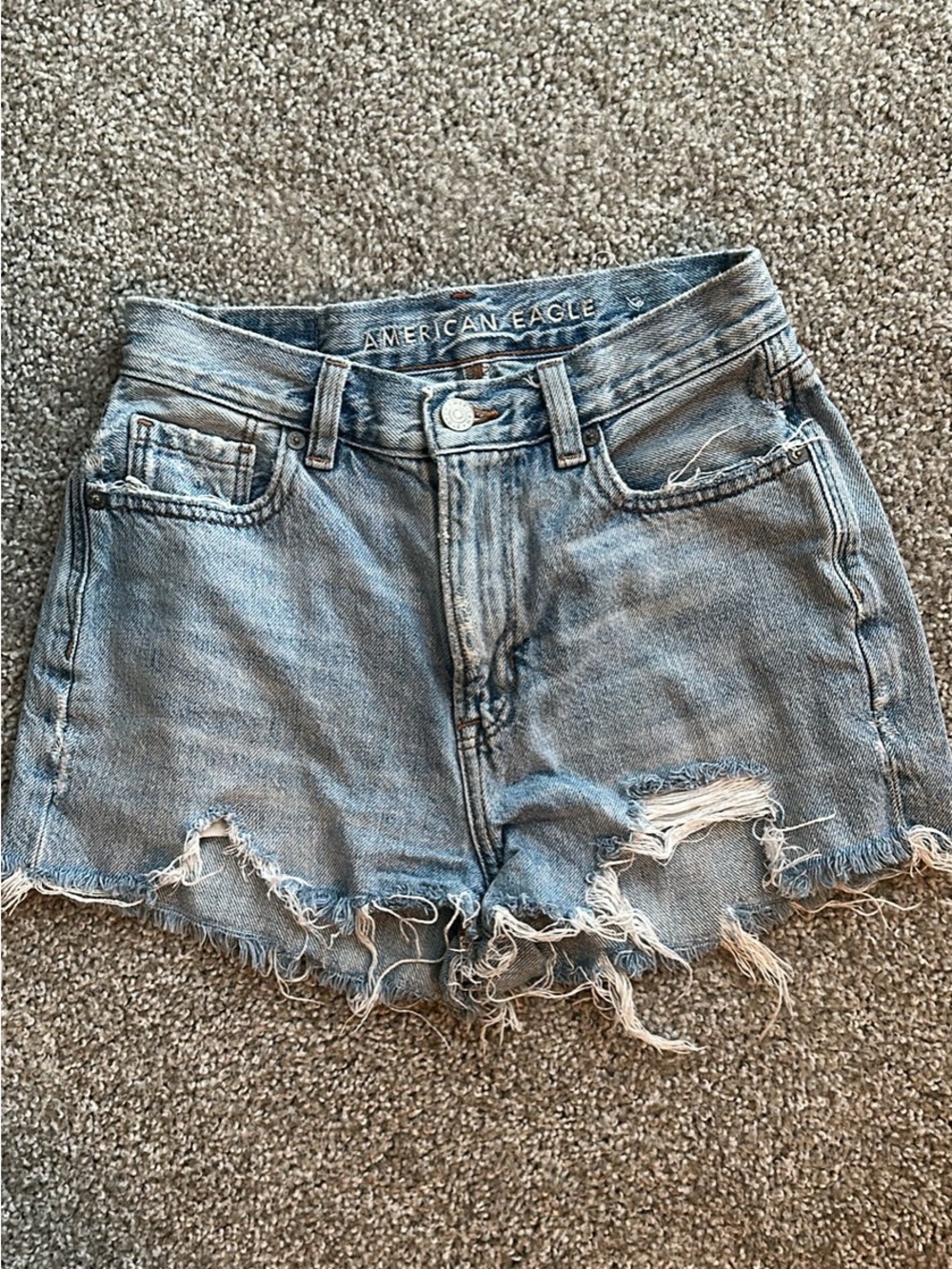 American Eagle Outfitters light wash frayed denim shorts